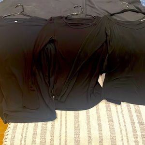 3 black long sleeve black shirts thin material perfect for summer.